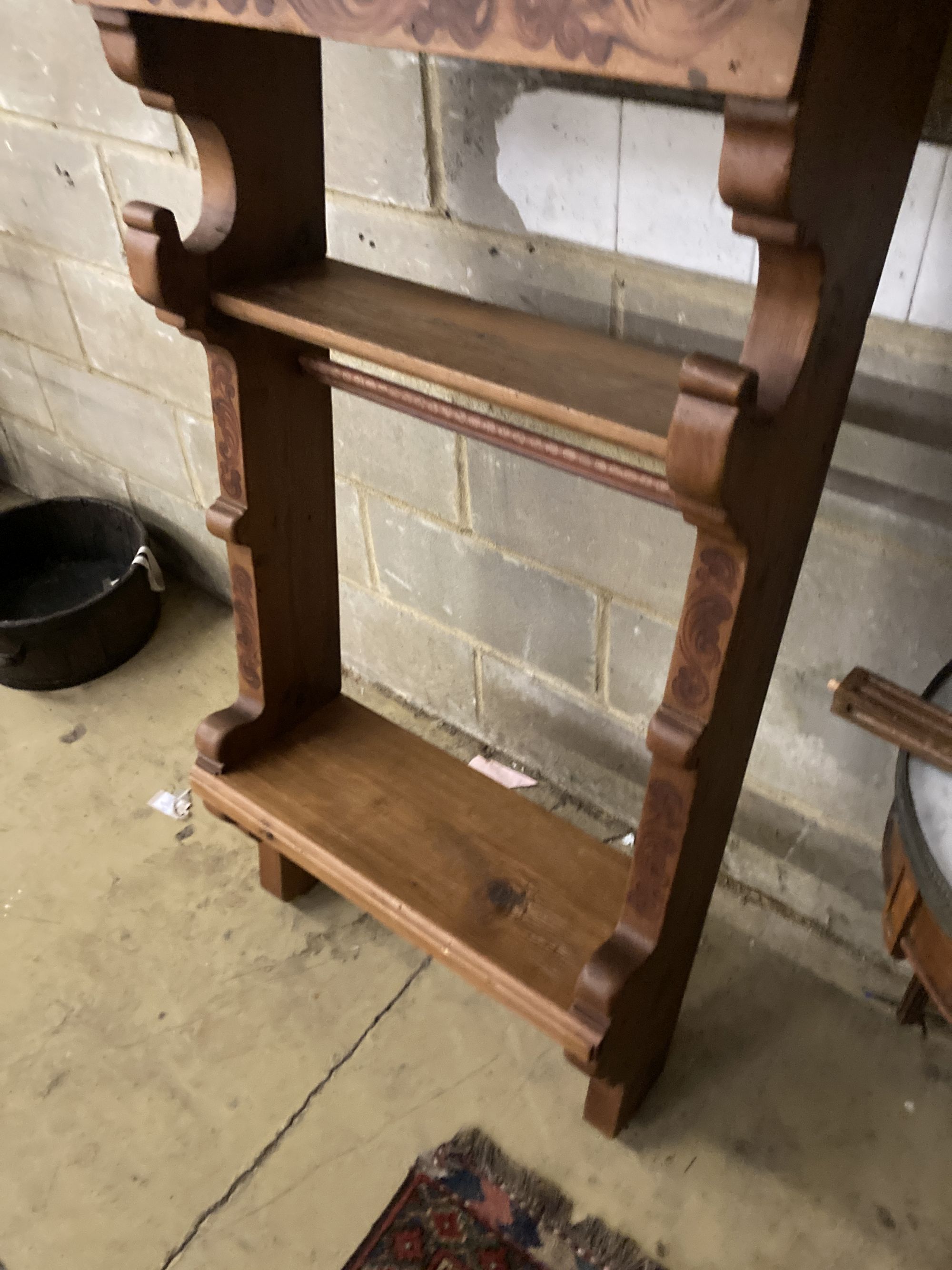 A Swiss painted pine hunting cabinet, width 70cm, height 190cm